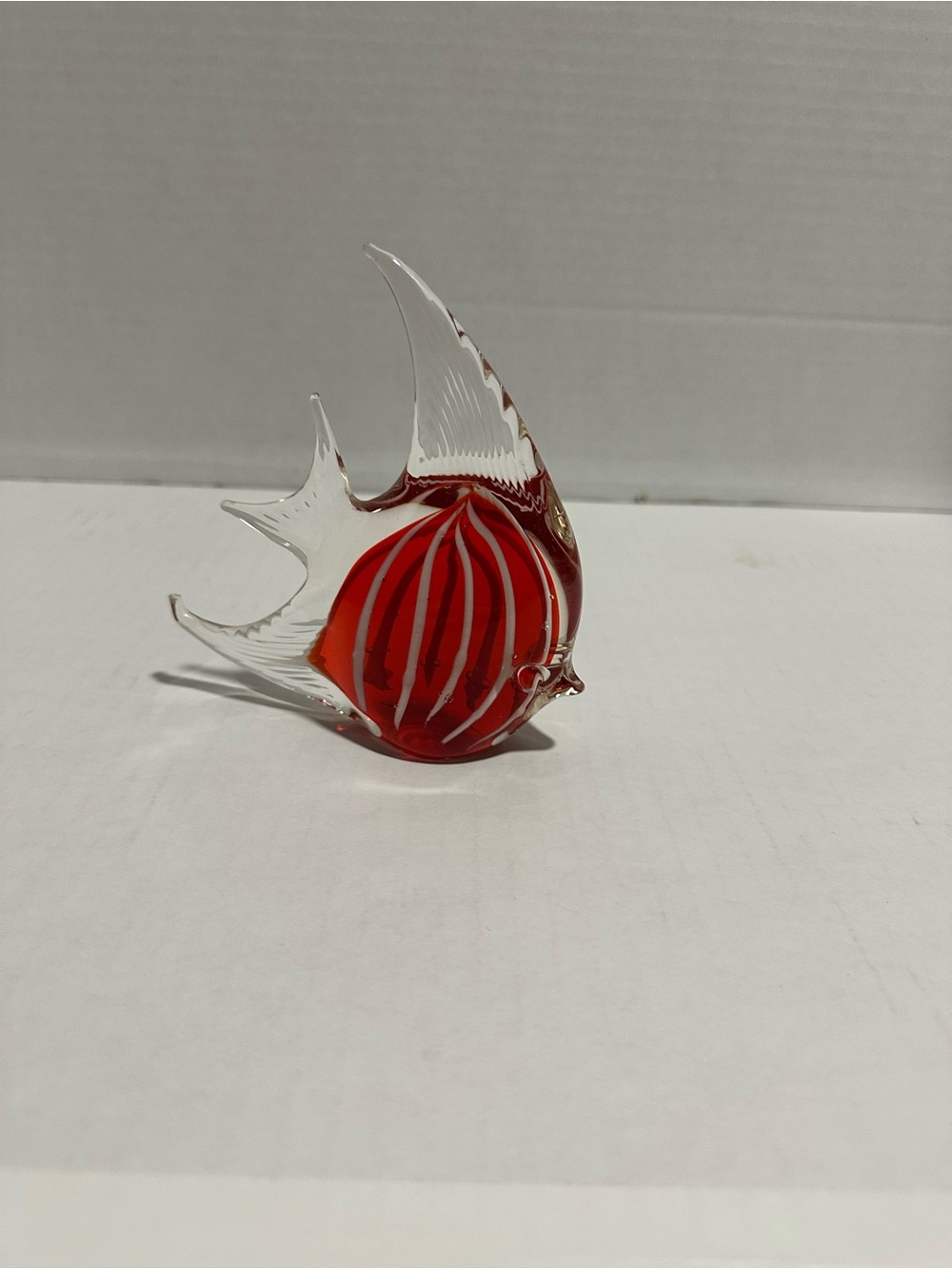 Red-and-white striped Murano-style art glass angelfish figurine